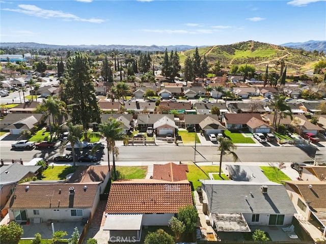 aerial view featuring a mountain view and a residential view