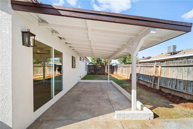 view of patio / terrace with a fenced backyard and cooling unit