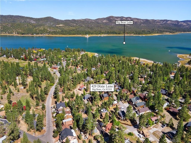 bird's eye view featuring a water and mountain view