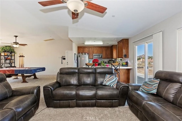 living area with billiards, visible vents, light colored carpet, ceiling fan, and vaulted ceiling