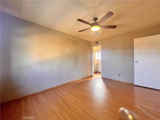 19863 Drasin Dr, Canyon Country, CA 91351 - empty room featuring light wood-style flooring, visible vents, ceiling fan, and baseboards