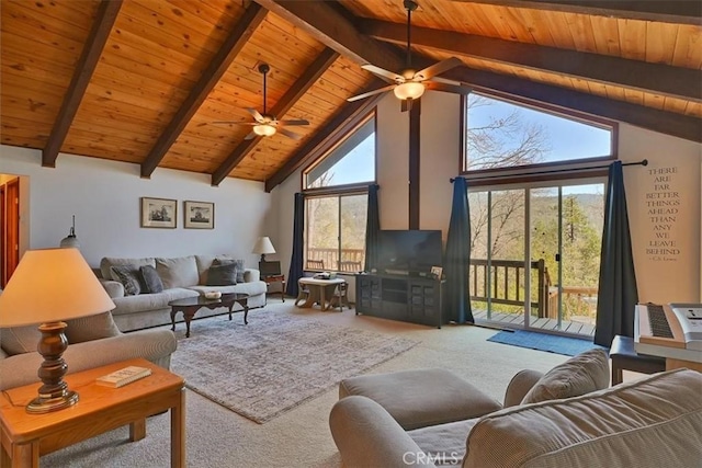 living area with high vaulted ceiling, light carpet, plenty of natural light, and beamed ceiling