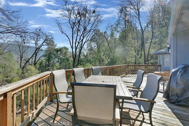 deck featuring outdoor dining space