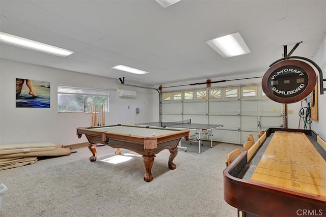 recreation room featuring a garage, carpet, an AC wall unit, and baseboards