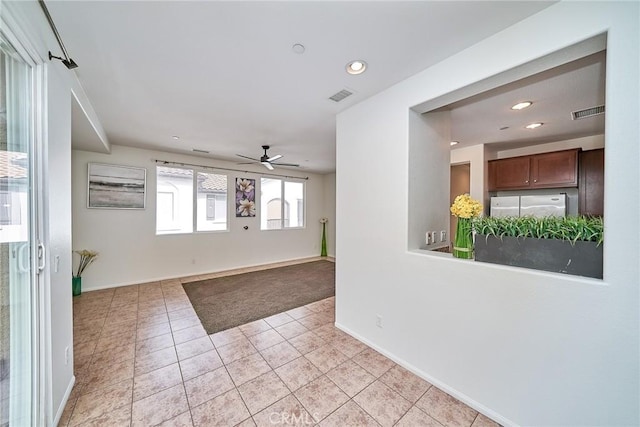 spare room featuring recessed lighting, visible vents, baseboards, and light tile patterned floors