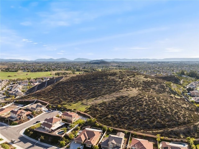 bird's eye view with a residential view and a mountain view