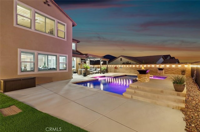 view of swimming pool with a patio, a fenced backyard, and a fenced in pool