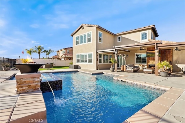 view of swimming pool featuring a ceiling fan, a fenced in pool, a fenced backyard, an outdoor hangout area, and a patio area