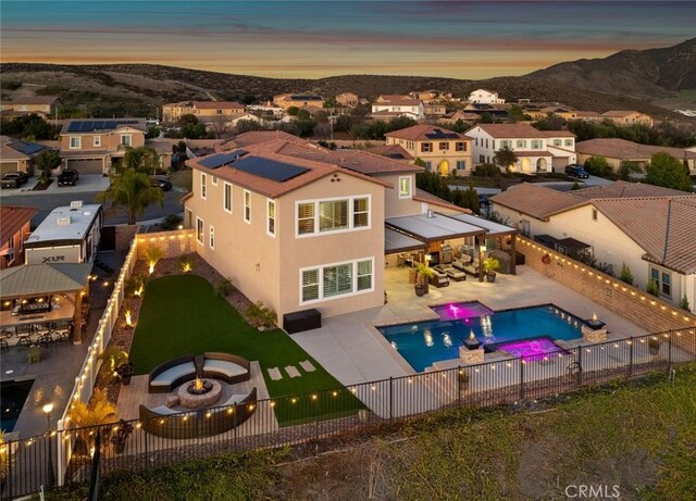 bird's eye view with a residential view and a mountain view