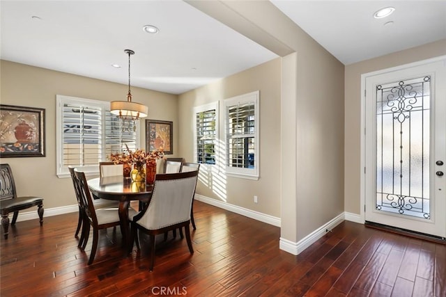 dining area featuring dark wood-style floors, baseboards, and recessed lighting