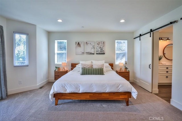 28622 Shenandoah Dr, Lake Arrowhead, CA 92352 - bedroom featuring a barn door, carpet floors, baseboards, and recessed lighting
