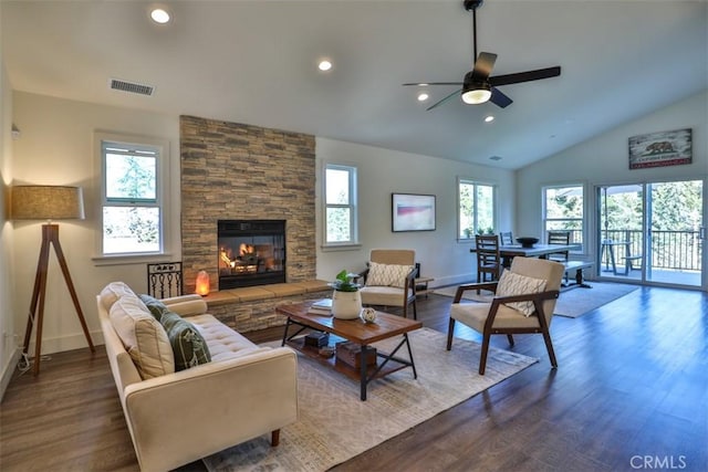 28622 Shenandoah Dr, Lake Arrowhead, CA 92352 - living area featuring plenty of natural light, a ceiling fan, lofted ceiling, a fireplace, and dark wood-style floors