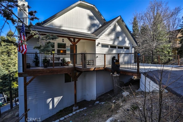 28622 Shenandoah Dr, Lake Arrowhead, CA 92352 - rear view of house featuring concrete driveway