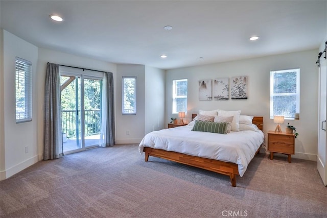 28622 Shenandoah Dr, Lake Arrowhead, CA 92352 - carpeted bedroom featuring access to exterior, baseboards, recessed lighting, and a barn door