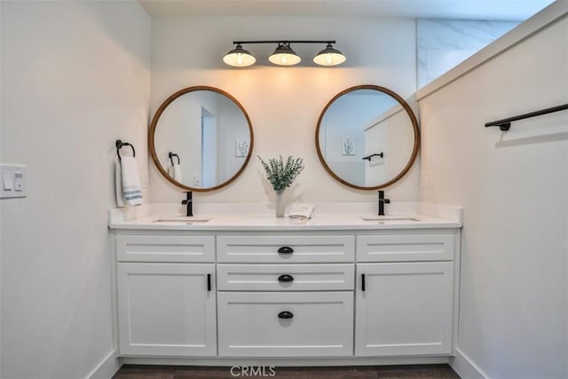28622 Shenandoah Dr, Lake Arrowhead, CA 92352 - bathroom with double vanity and baseboards