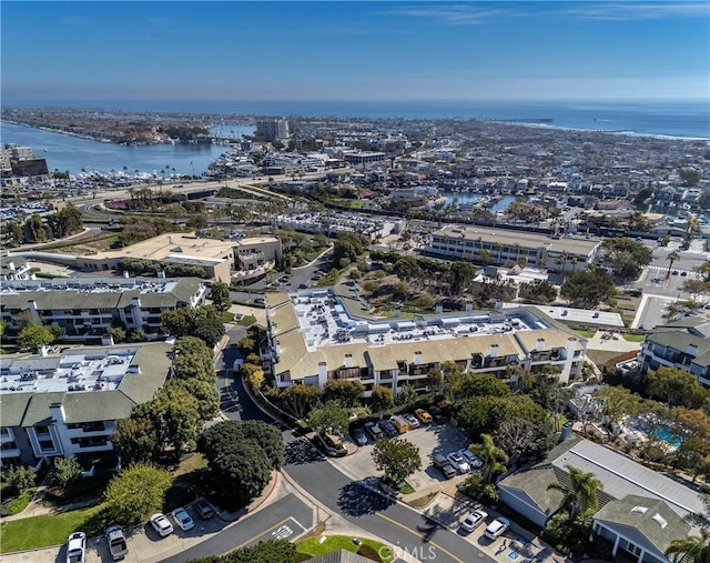 aerial view with a water view and a city view