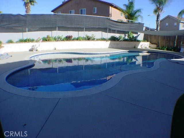 view of pool featuring a fenced in pool and fence