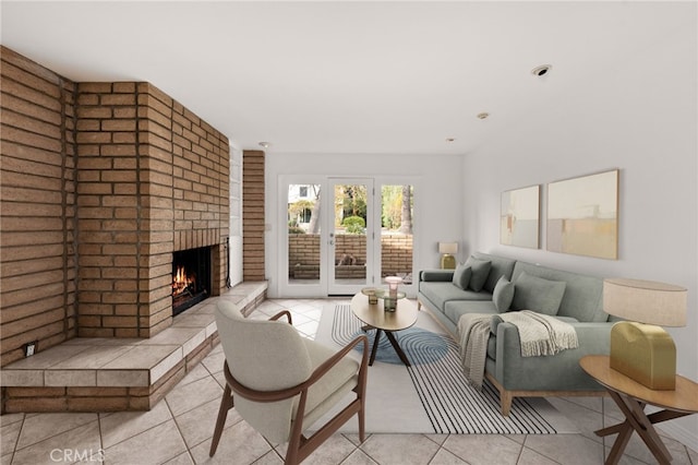 living area with light tile patterned floors and a fireplace