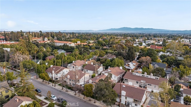 drone / aerial view featuring a mountain view and a residential view