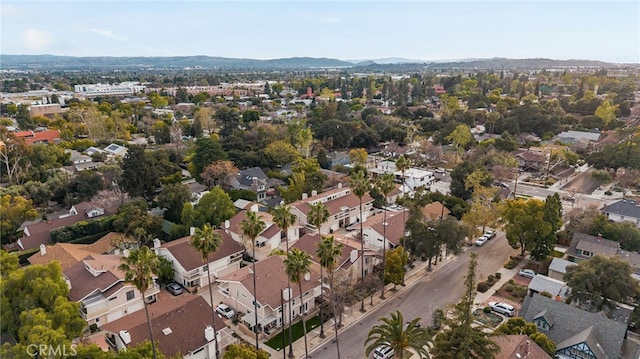 drone / aerial view with a residential view and a mountain view