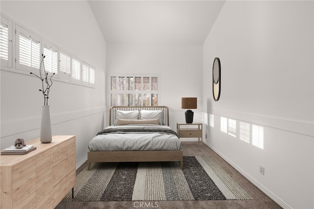 bedroom with carpet flooring, multiple windows, and baseboards