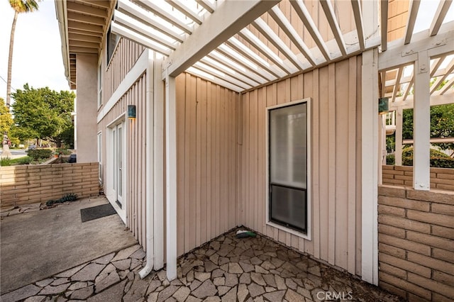 view of home's exterior featuring a patio area and board and batten siding