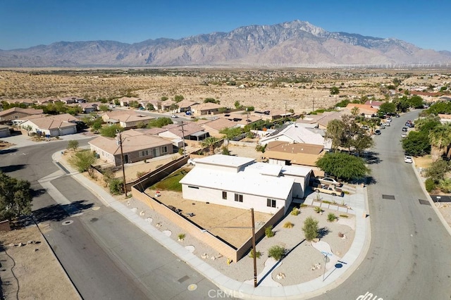 bird's eye view with a residential view and a mountain view