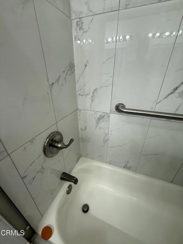 full bathroom with shower / bath combination