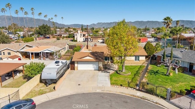 aerial view with a residential view and a mountain view