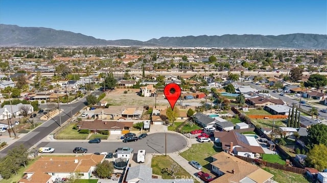 bird's eye view featuring a residential view and a mountain view