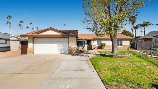 ranch-style house featuring a garage, concrete driveway, a front yard, and fence