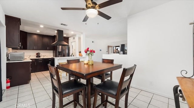 dining area with light tile patterned floors, recessed lighting, visible vents, a ceiling fan, and baseboards