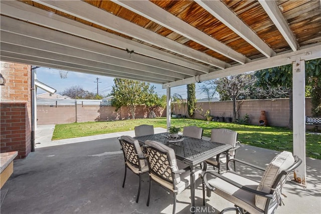 view of patio / terrace with outdoor dining area and a fenced backyard