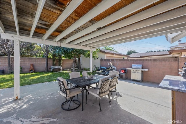 view of patio / terrace featuring a fenced backyard and outdoor dining area