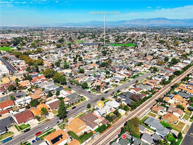 bird's eye view featuring a residential view and a mountain view