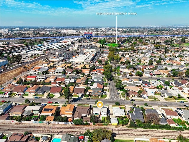 birds eye view of property with a residential view