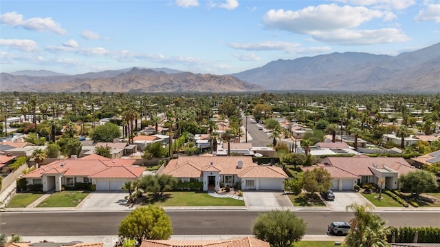 bird's eye view with a residential view and a mountain view