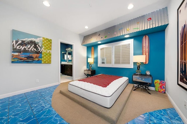 carpeted bedroom featuring baseboards, connected bathroom, and recessed lighting