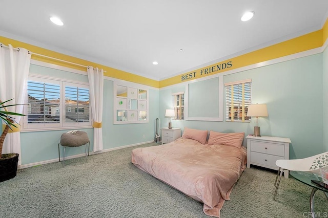 carpeted bedroom featuring recessed lighting and baseboards