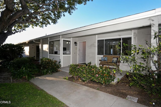 view of front of home with stucco siding