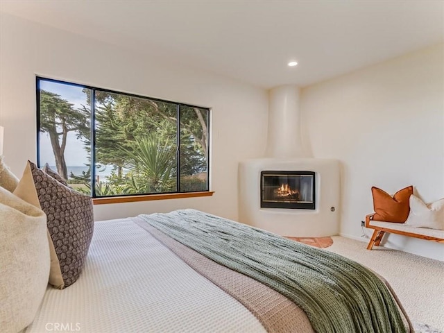 bedroom with carpet and recessed lighting