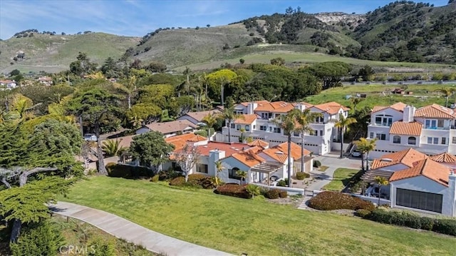 birds eye view of property with a residential view and a mountain view