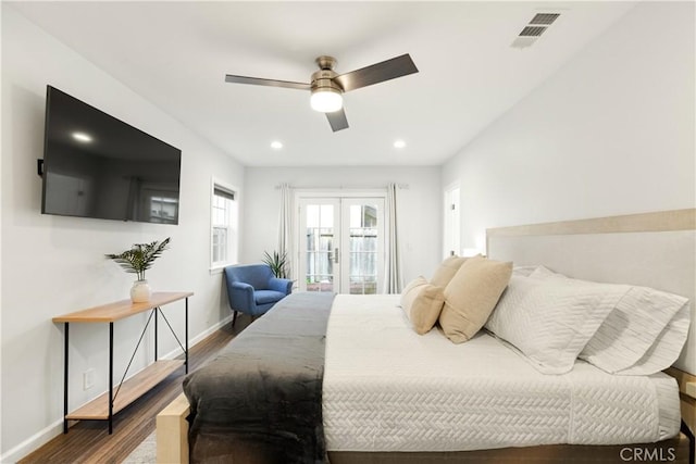 bedroom with french doors, recessed lighting, visible vents, wood finished floors, and baseboards