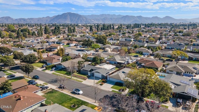 bird's eye view with a residential view and a mountain view