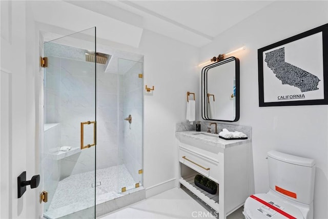 full bathroom with toilet, a marble finish shower, and vanity