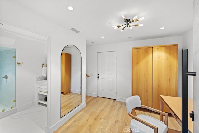 home office with light wood-style floors, recessed lighting, visible vents, and baseboards