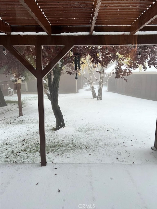 view of yard layered in snow