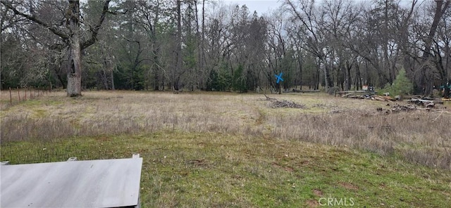 view of local wilderness featuring a view of trees