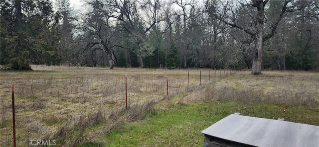 view of yard featuring a view of trees