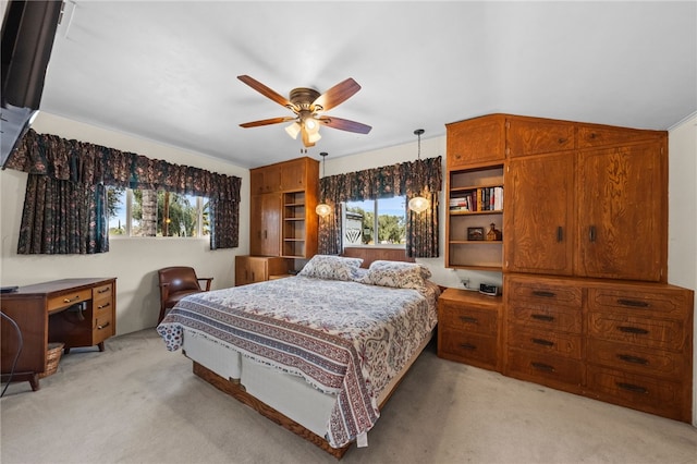 bedroom featuring vaulted ceiling, ceiling fan, and light colored carpet